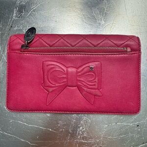 Vintage Chanel Bow pink wallet. Never used, color slightly faded due to storage